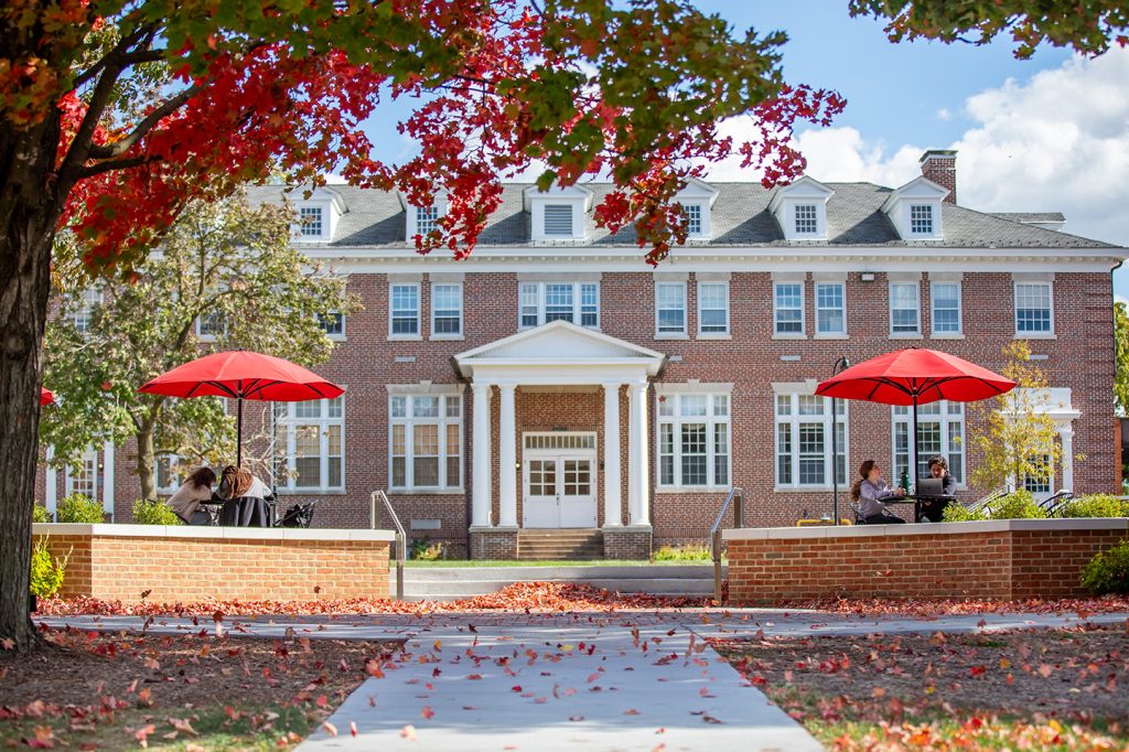 Rebecca Quad on Bridgewater College campus in the fall with leaves on the ground